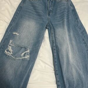 Distressed Blue Denim Jeans